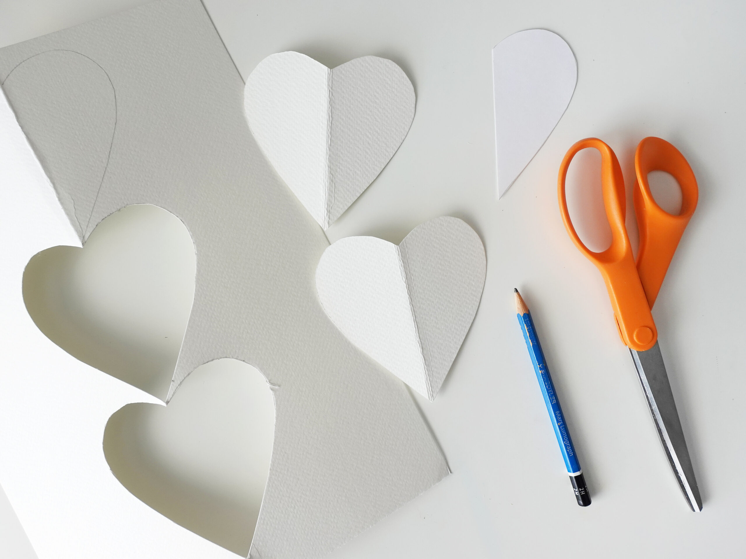 DIY Painted Paper Heart Garland by Joanna Baker